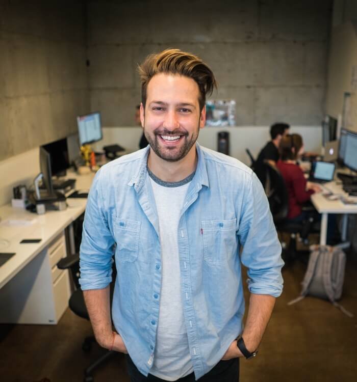 Man Standing with hands in Pockets